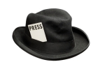 Old fedora felt hat with a press card